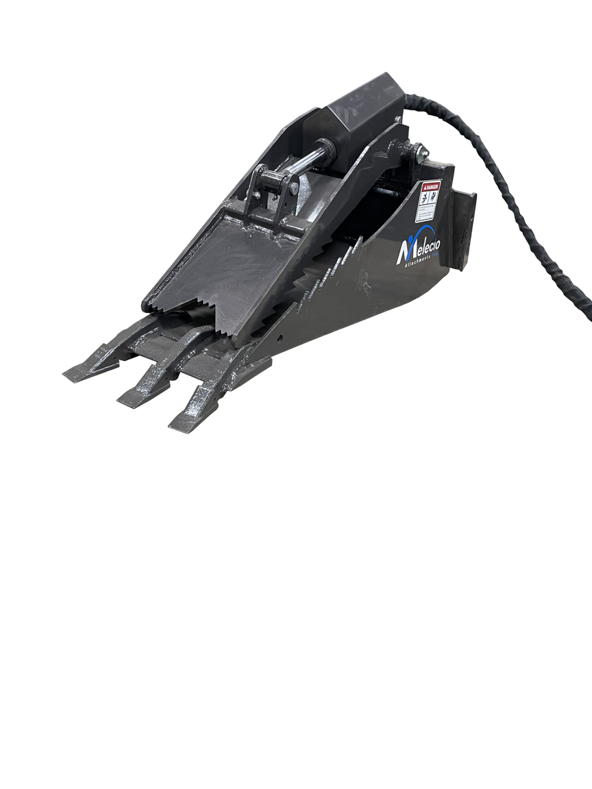 Close-up of a black industrial cutting attachment with steel blades and hydraulic hoses, labeled "Melroe." The Dingo Stump Bucket is situated on a concrete floor in an indoor setting.