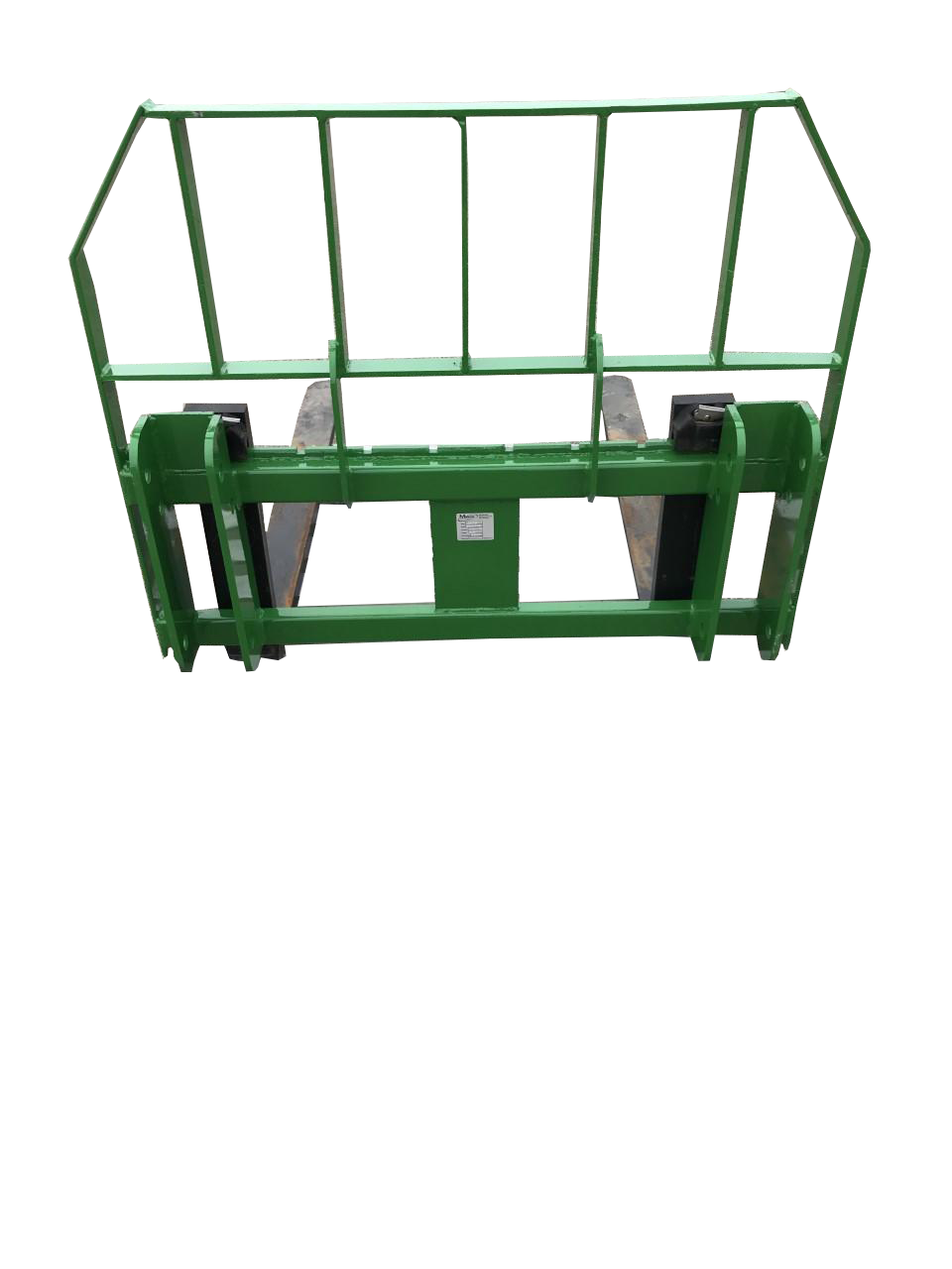 A John Deere Pallet Fork 148 with green metal vertical bars stands on a gray, textured ground.
